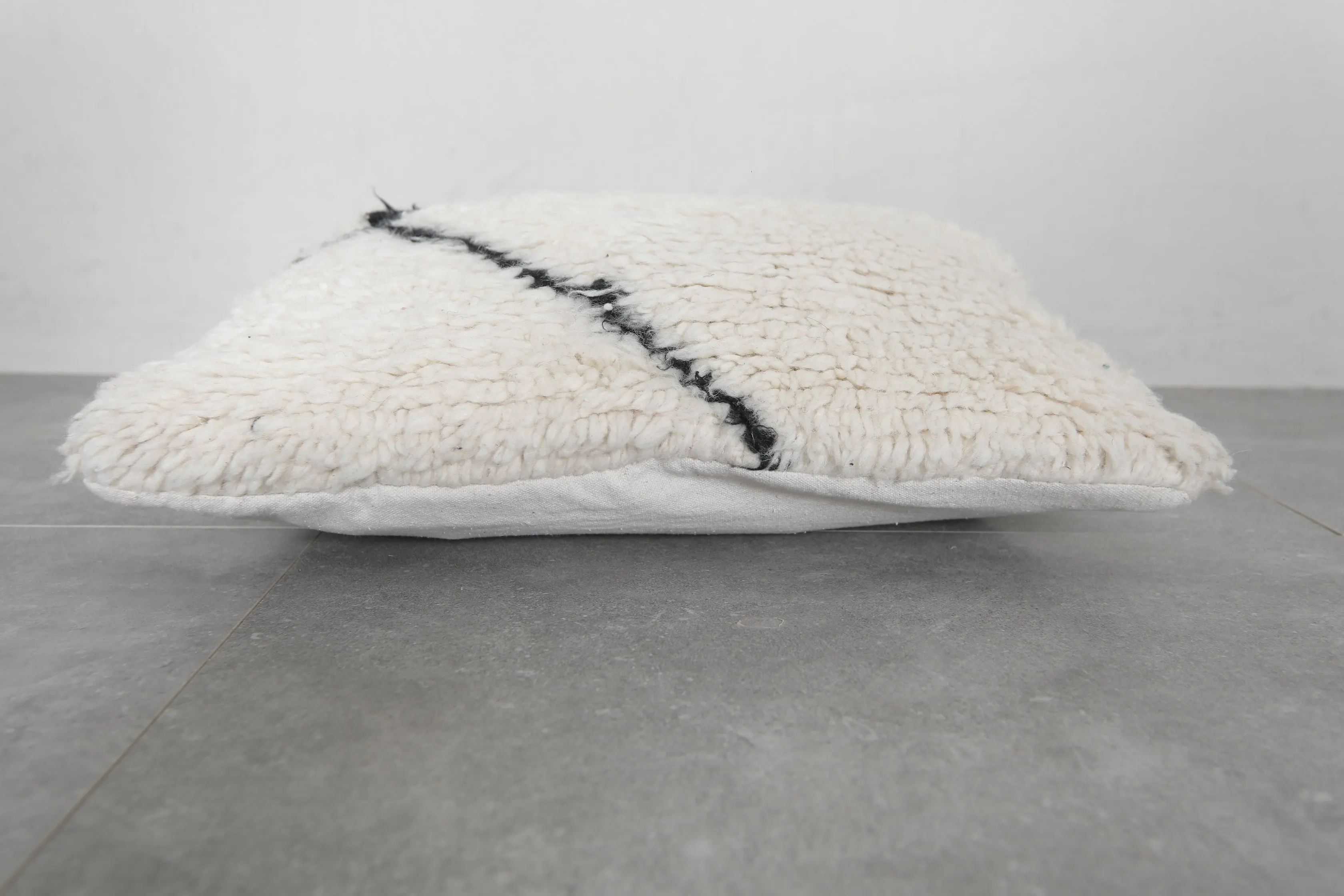 Luxurious Moroccan Wool Pillow in Cream with Black Accent - 16.5 x 22 Inches